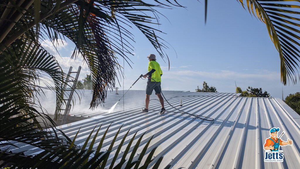 Pressure cleaning metal roof at Mountain Creek