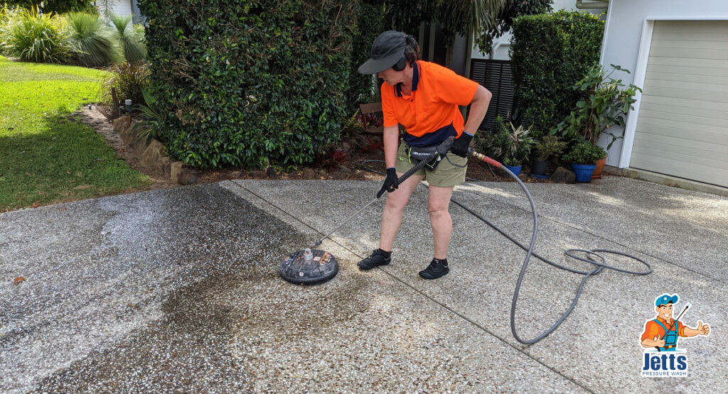 Cleaning driveway with surface cleaner pressure wash